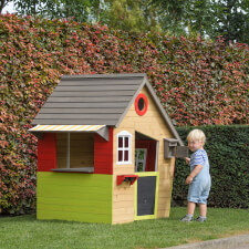 Kids playing in the Fairytale playhouse.