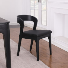 The optional dining chair in Black Ash.