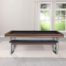 The Marseille slate bed pool dining table in walnut with one matching bench.