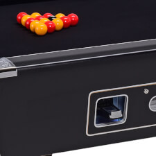 An Essex Straight Six coin mech installed on a pool table.