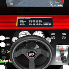 The A1Up Ridge Racer arcade machine wheel and controls.