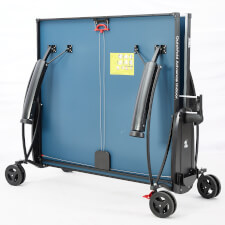 The Quickfold Indoor 18 tennis table closed.
