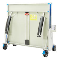 The Quickfold Advance Outdoor tennis table closed.