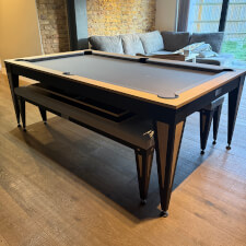 The Pureline Blade Pool Table in a black/oak finish and grey cloth.