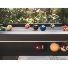 The Cornilleau Origin Outdoor Pool Table Black playing surface.