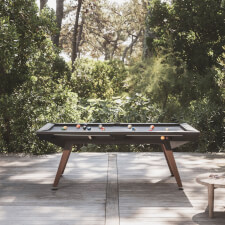 The Cornilleau Origin Outdoor Pool Table Black playing surface.