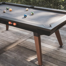 The Cornilleau Origin Outdoor Pool Table Black playing surface.