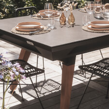 The Cornilleau Origin Outdoor Pool Table Black converted into DIning Table.