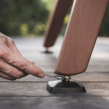 The Cornilleau Origin Outdoor Pool Table Black feet.