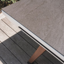 The Cornilleau Origin Outdoor Pool Table Top close up.
