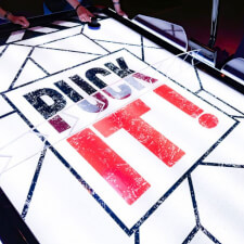 The Sega PUCK IT air hockey table playfield.