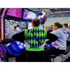 People racing the Sega Storm Rider 2 Motion Twin arcade machine.