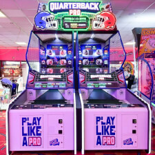 The Sega Quarterback pro twin arcade machine.