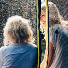 The Plum Space Zone II Springsafe trampoline with enclosure close up.