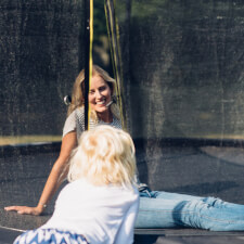 The Plum Space Zone II Springsafe trampoline with enclosure close up.