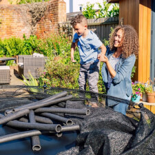 The Plum Space Zone Springsafe Trampoline and enclosure assembly.