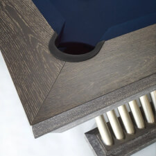 The Brunswick Brescia slate bed pool table pocket.