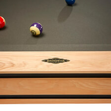 The Brunswick Hickory slate bed pool table brand detail.
