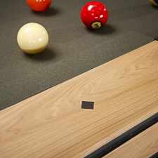 The Brunswick Hickory slate bed pool table frame sign.