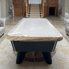 The cover fitted to an indoor table.