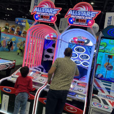 Playing the Allstars Ultimate Disc Arcade Machine.