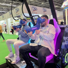 People playing Alpha Ops VR Strike Arcade Machine.