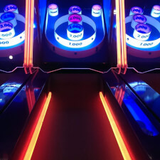 The Ice Ball FX Arcade Alley Bowler installed in a games room.