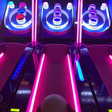 The Ice Ball FX Arcade Alley Bowler installed in a games room.