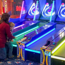 The Ice Ball FX Arcade Alley Bowler installed in a games room.