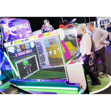 People Playing World Football Pro Arcade Machine.