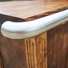 Detail of the hand rail on the Traditional 1550 home bar.