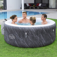 Family enjoying the Lay-Z-Spa Boracay AirJet Hot Tub.