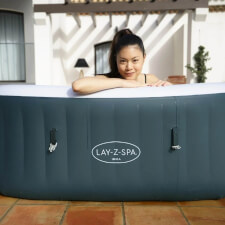 People enjoying the Lay-Z-Spa Ibiza Hot Tub.