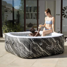People enjoying the Lay-Z-Spa Florence AirJet Hot Tub.