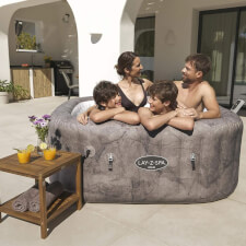 Family enjoying the Lay-Z-Spa Rome Airjet Hot Tub.