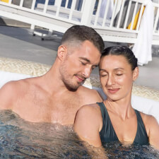 Couple enjoying Lay-Z-Spa Tuscany Airjet Hot Tub.