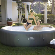 People enjoying Lay-Z-Spa Mauritius AirJet Hot Tub.