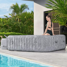 Woman enjoying the Lay-Z-Spa San Francisco HydroJet Pro Hot Tub.