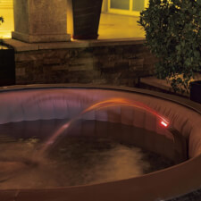 The Lay-Z-Spa LED Illuminated Hot Tub Waterfall at Night.