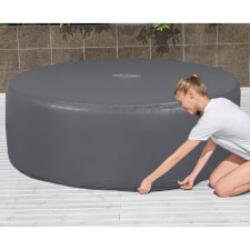 The Circular Round Thermal Hot Tub Cover being placed