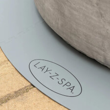 The Laz-Y-Spa Round Floor Protector Mat close up.