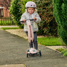 A Kid Riding The Ride-Ezy Kick & Go Ride On & Scooter.