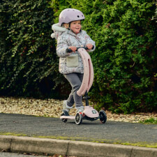 A Kid Riding The Ride-Ezy Kick & Go Ride On & Scooter.