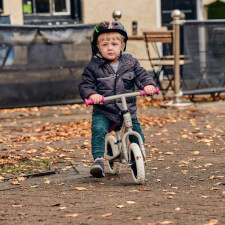 A Kid Riding the Ride-Ezy Go Balance Bike.