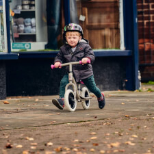 A Kid Riding the Ride-Ezy Go Balance Bike.
