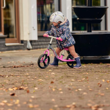 A Kid Riding the Ride-ezy Go Glo Balance Bike.