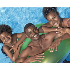 Family enjoying the Rattan Fast Set Pool.