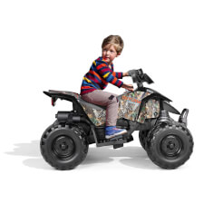 Kid enjoying Polaris Outlaw 330W Ride On Motorbike in Camo.