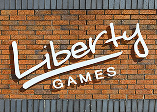 Liberty Games Logo on Brick