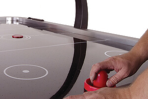 The playfield on a Strikeworth air hockey table.